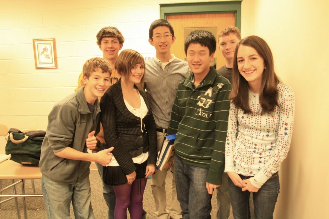 Teacher Shawn with students in 2008